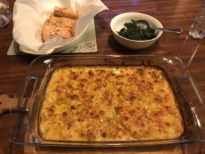 Keto cauliflower gratin shown with my dinner of salmon and spinach...yum!