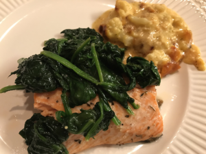 Pescatarian keto salmon with spinach and cauliflower au gratin on the side